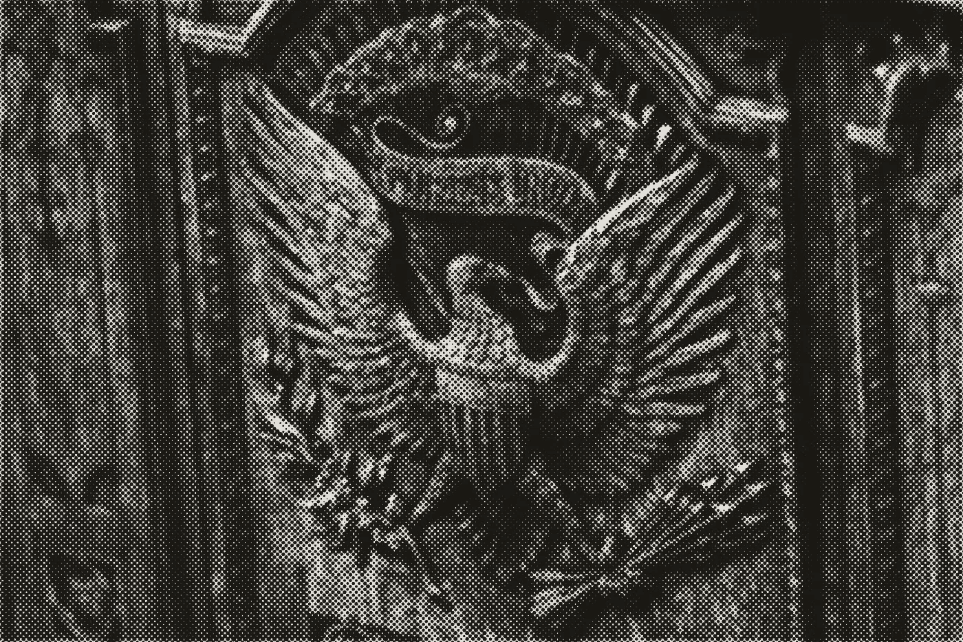Halftone photograph of the carved eagle on the Resolute Desk